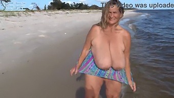 Mature Woman Flaunts Her 40m Tits At The Beach